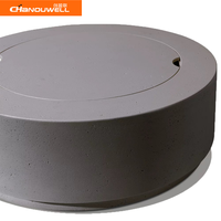 Table de feu ronde de couleur gris foncé au design minimaliste pour l'extérieur, foyer extérieur décoratif pour hôtel