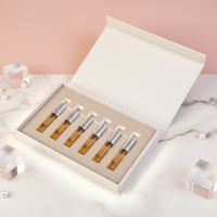 Boîte en papier rigide de luxe à fermeture magnétique, papier texturé gaufré, insert en EVA au toucher doux pour l'emballage de sérum de peptides et d'ampoules