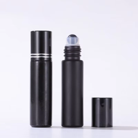 Vente en gros de flacons à bille en cristal semi-précieux de 10 ml, flacon en verre noir pour massage des yeux, distributeur d'huile essentielle pour parfums et cosmétiques