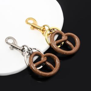 Creative Biscuit Metal Keychain High Quality Hot Selling Pendants Car Metal Keychain Women <b>Bag</b> Charms Wholesale - Product Image 1