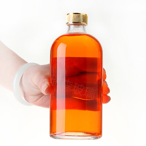 Bouteille en verre ronde pour café, boisson, jus, thé aux fruits, impression sérigraphique noire, bouchon spiralé transparent, ambre lumineux, 16 oz, 500 ml - Product Image 1