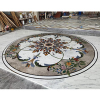 Carrelage en marbre à motif de tapis incrusté de médaillons, découpé au jet d'eau, pour revêtement de sol de villa