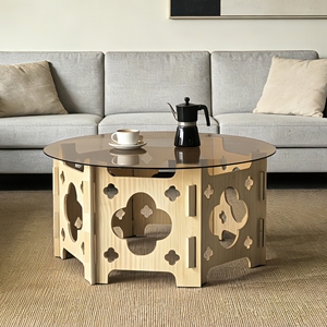 Tavolino da Caffè Rotondo in Vetro Temperato con Piano Caramello e Base in Legno Traforato Stile Rustico - Product Image 2