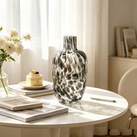 Flacon d'aromathérapie en verre transparent de haute qualité et tendance avec patch 3D moucheté