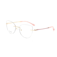 Cadre optique en titane sans monture en forme d'oeil de chat haut de gamme Design de temple de mode Lunettes en titane pour femmes