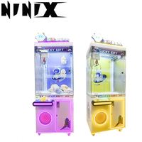 Prix des machines à griffes : Mini attrapeur de récompenses de 24 pouces, armoire à monnayeur, unité de jeu d'arcade à grue pour bonbons et capsules, boîtier de jeu