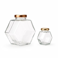 Tarro de miel hexagonal de vidrio con tapa de madera para embalaje de boutique, suministro de fábrica