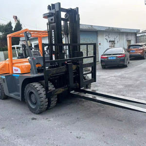 Chariot élévateur diesel d'occasion Vigoshop TCM FD70 durable avec mât multi-étages et performances stables en stock - Product Image 1