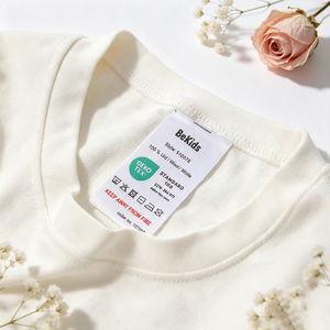 Étiquettes tissées personnalisées de haute qualité à pliure latérale, en tissu beige écologique, avec logo de marque pour jeans, t-shirts et vêtements - Product Image 3