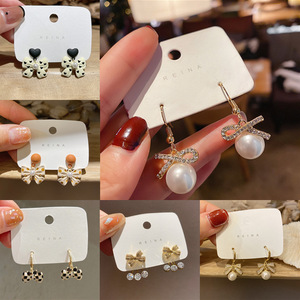 ต่างหูเข็มเงิน S925แบบเกาหลีมีโบว์ต่างหูมุกแบบเรียบง่ายทันสมัยสำหรับผู้หญิงใหม่2024 - Product Image 2