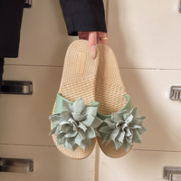 Nouvelles tendances de la mode estivale 2025 Sandales plates pour femmes avec un design floral inspiré d'un nœud Sandales de plage pour femmes en gros