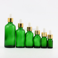 Flacon en verre vert de 30 ml (1 oz) pour sérum de soin de la peau, avec logo personnalisé, bulbe en caoutchouc et compte-gouttes doré