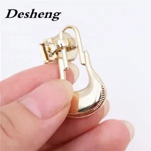 Hot selling backpack metal slider leather zipper puller, metal slider bag zip pullers