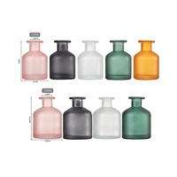 Bouteille de diffusion de parfum en verre de diffuseur de roseau d'arôme colorée personnalisée de 130 ml 250ml de luxe ronde claire et noire mate