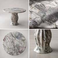 Table à manger ronde de luxe en marbre blanc éléphant naturel, base sculpturale cannelée, style moderne, pour hôtel, 4 places, sur mesure
