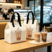 Sac de livraison isotherme non tissé avec logo personnalisé et doublure en feuille d'aluminium pour les besoins de vente en gros de plats à emporter pour restaurants et cafés