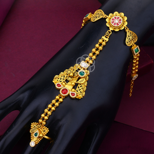 Elegante pulsera de cadena dorada con detalles florales y adornos de piedras preciosas de colores, joyería nupcial tradicional. - Product Image 1