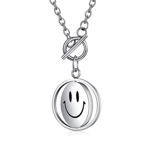 This Instagram-worthy rotating necklace features a sad/laughing face design, is unisex, and has a unique, niche design. It's a c - Product Image 5