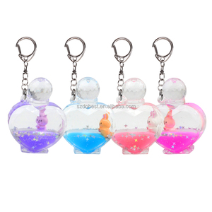 Porte-clés en forme de cœur avec flacon de <span class=keywords><strong>parfum</strong></span> mignon, pendentif créatif pour sac, cadeaux populaires, grand format, en plastique scintillant, vente en gros - Product Image 1