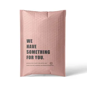 Sacchetto imbottito di spedizione rosa chiaro opaco a base biologica busta di colore nudo logo stampato personalizzato disegni posta bubble mailer