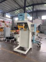 Machine d'emballage de précision durable pour le remplissage et la fermeture de produits tels que les graines de soja, le maïs, les noix, les aliments pour animaux et les engrais composés