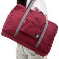 L'industrie Chine Vente en gros Sac de voyage Réutilisable Personnalisé RPET Sac de rangement pliable pour vêtements Sac pliable Voyage