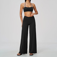 Nouvel ensemble de sport pour femme : haut court à col halter effet superposé et pantalon taille haute pour la course et le fitness