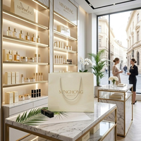 Sac en papier ivoire élégant avec logo personnalisé en or à chaud, idéal pour les boutiques de cosmétiques, emballage cadeau, soins de la peau