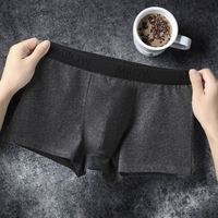 Boxer taille moyenne personnalisé pour hommes Ceinture élastique Motif brodé Conception sans couture. RTS Bulge Pouch Sous-vêtements de base pour homme