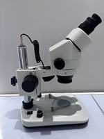Microscope stéréoscopique électrique à zoom binoculaire CHINCAN E0745-CLT de haute qualité 0,7X à 4,5X