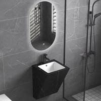 Ensemble de meuble-lavabo de salle de bain d'hôtel en pierre frittée résistante personnalisée en marbre noir et blanc moderne avec miroir intelligent à LED