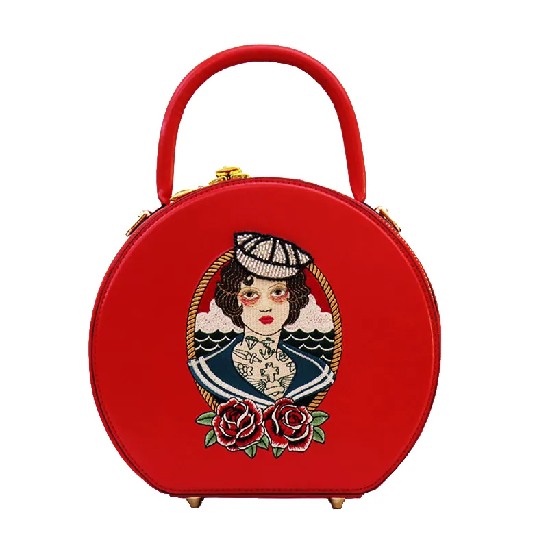 WS Sesuaikan Tas Wanita Merek Anda Sendiri Mode Baru Tas Bundar Kecil Desain Retro Merah Tas PU Wanita Bordir Lucu