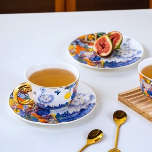ชุดถ้วยชาและจานรองเซรามิคทรงกลมแบบไม่สมมาตร ถ้วยกาแฟตกแต่งสำหรับงานเลี้ยงและเป็นของขวัญ - Product Image 2