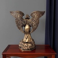 Statue d'archange à ailes épanouies en résine effet bronze style européen vintage, tenant un globe étoilé sur base nuageuse, pour la maison et le bureau