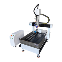 Nouvelle machine de gravure et de fraisage CNC multifonctionnelle de bureau 6090 à 4 axes avec changement automatique d'outils pour cylindres plats