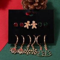 2025 nouvelle mode noël boucle d'oreille dessin animé vacances alliage émail goutte d'huile renne Santa cloche conception boucle d'oreille ensemble pour noël