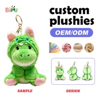 Porte-clés en peluche personnalisé OEM, mini chien en peluche avec costume de dinosaure vert, rembourré en coton doux, animal en peluche