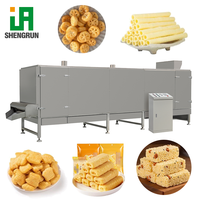 Ligne de production de snacks de riz remplis par extrudeuse bivis, avec expansion réglable, adaptée au remplissage liquide-solide, pour snacks multigrains