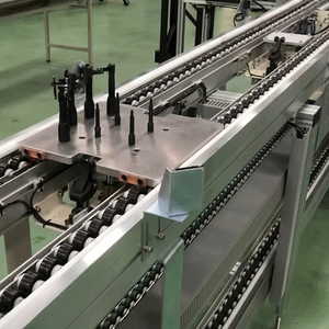 Automated Double Speed Chain Conveyor with Precision Positioning Module for Seamless Integration into Robotic Assembly Cells - Product Image 1