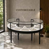 Comptoir de présentation de bijoux rond sur mesure avec vitrine incurvée en verre et éclairage LED pour mobilier de magasin de bijouterie