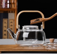 Vente en gros de théière en verre borosilicaté avec manche en bois de bambou théière bouillante résistante à la chaleur