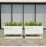 Bacs à fleurs et jardinières en acier inoxydable de haute qualité, en stock, pour les rues commerciales municipales.
