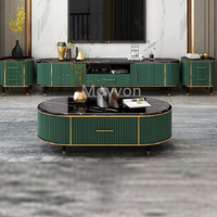 Table basse ronde de luxe exquise en acier inoxydable et base en bois massif pour salon et salle à manger à Foshan