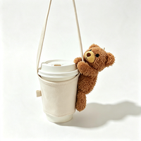 Support de tasse en peluche Kawaii en forme d'ours avec sangle de transport fixe, manchon anti-brûlure pour tasses de thé au lait à emporter, idéal pour les sorties et le shopping