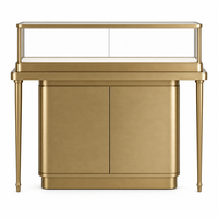 Vitrine à bijoux moderne en métal doré avec éclairage LED et rangement dissimulé pour les magasins de bijoux en gros