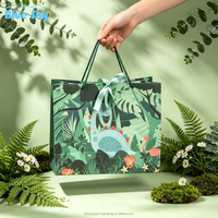 Sacs shopping en papier personnalisés OEM/ODM avec nœud papillon pour vêtements, bijoux, cadeaux, emballage en papier, sac fourre-tout, vente en gros