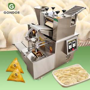 Machine automatique pour la fabrication de Jiaozi, Sambousek, Potsticker, Bade Wala, Samosa et autres types de Samosas - Product Image 1