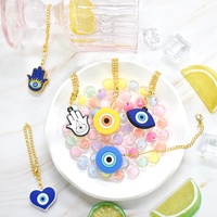 Vente en gros de chaînes de tasses mignonnes accessoires en forme de mauvais œil pour tasse breloques de couverture de paille accessoires pendentifs de tasse en verre