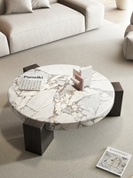Table basse en marbre design moderne nordique pour salons à domicile, table basse ronde en marbre pour villas.
