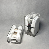 Boîte à montre en plastique transparent de marque célèbre, prête à être expédiée, cercueil à montre, 100 pièces, faible MOQ avec prix de gros